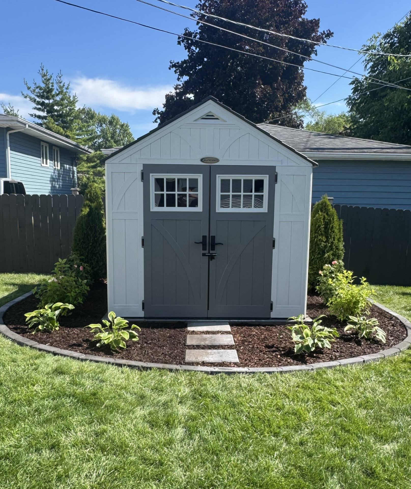 After: Shed foundation planting bed installation.